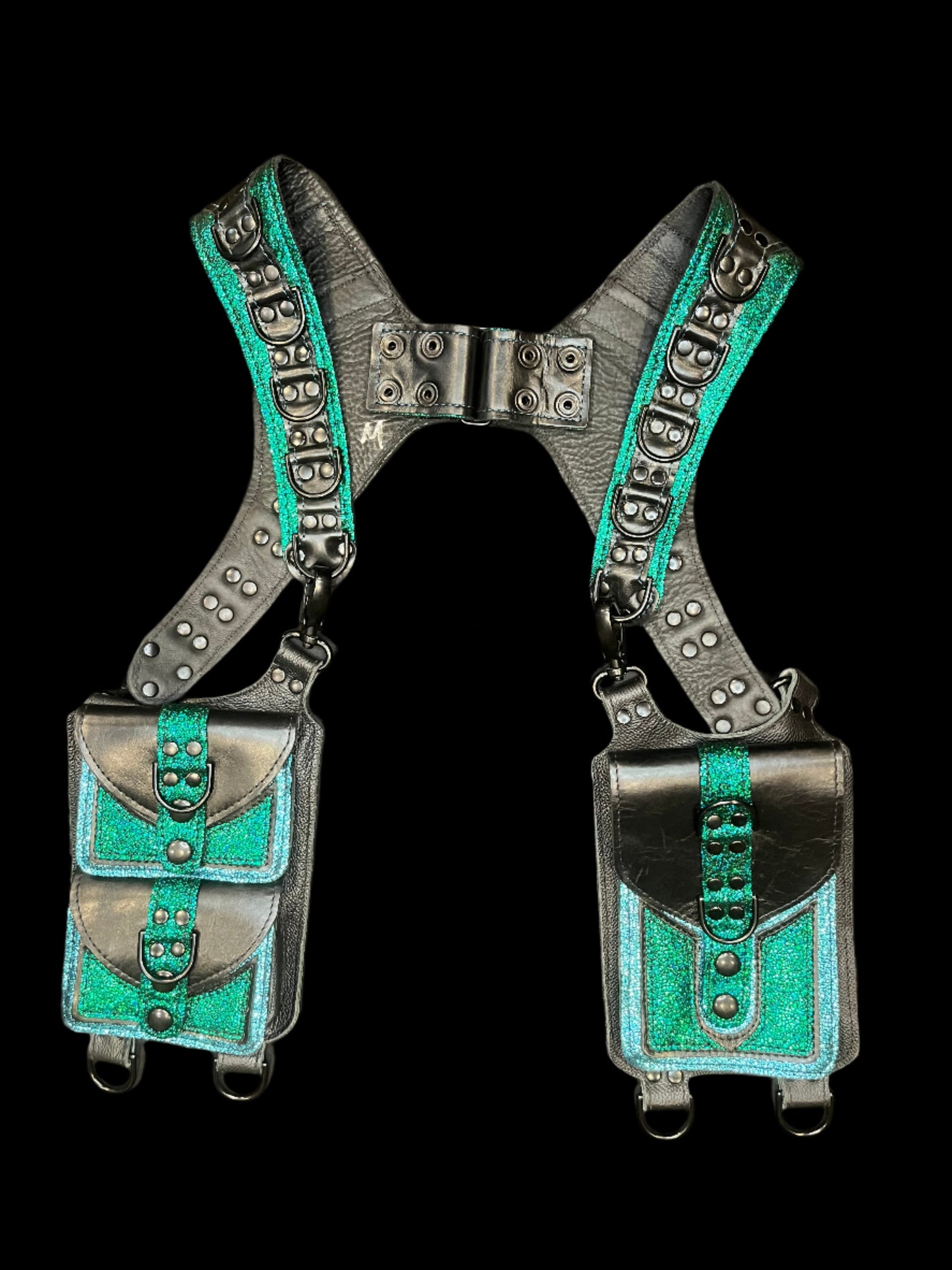 Dark magic holster laid flat on a black background