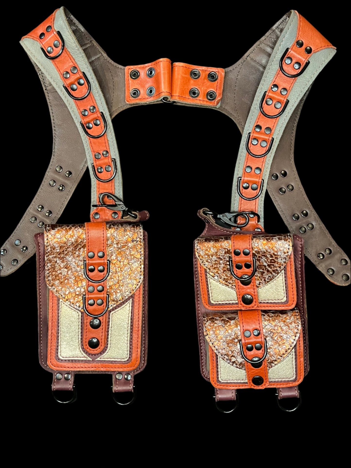 Carnelian Koi Holster laid flat on black background showing grey and orange leathers