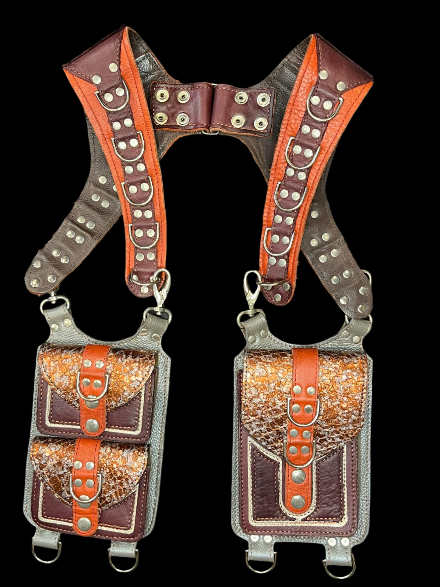 Carnelian Koi Holster in orange and grey leathers laid flat on a black background