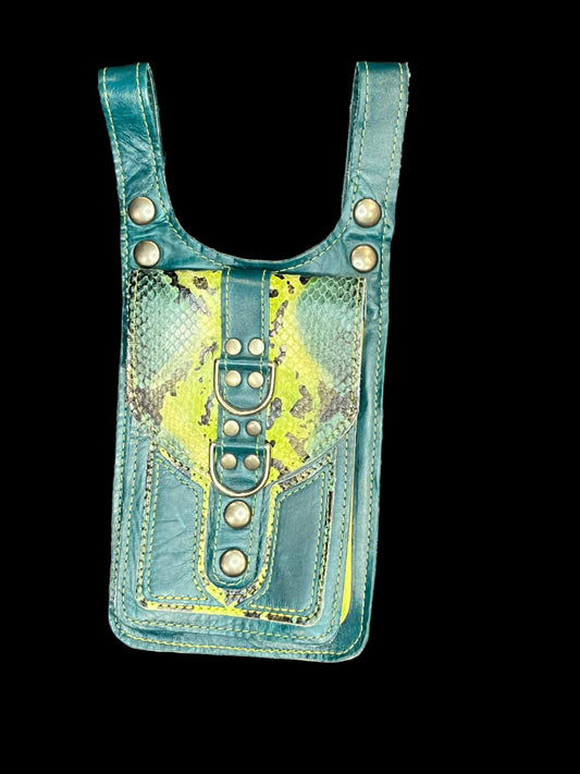 teal green and python print leather thigh bag with nickel hardware on a black background