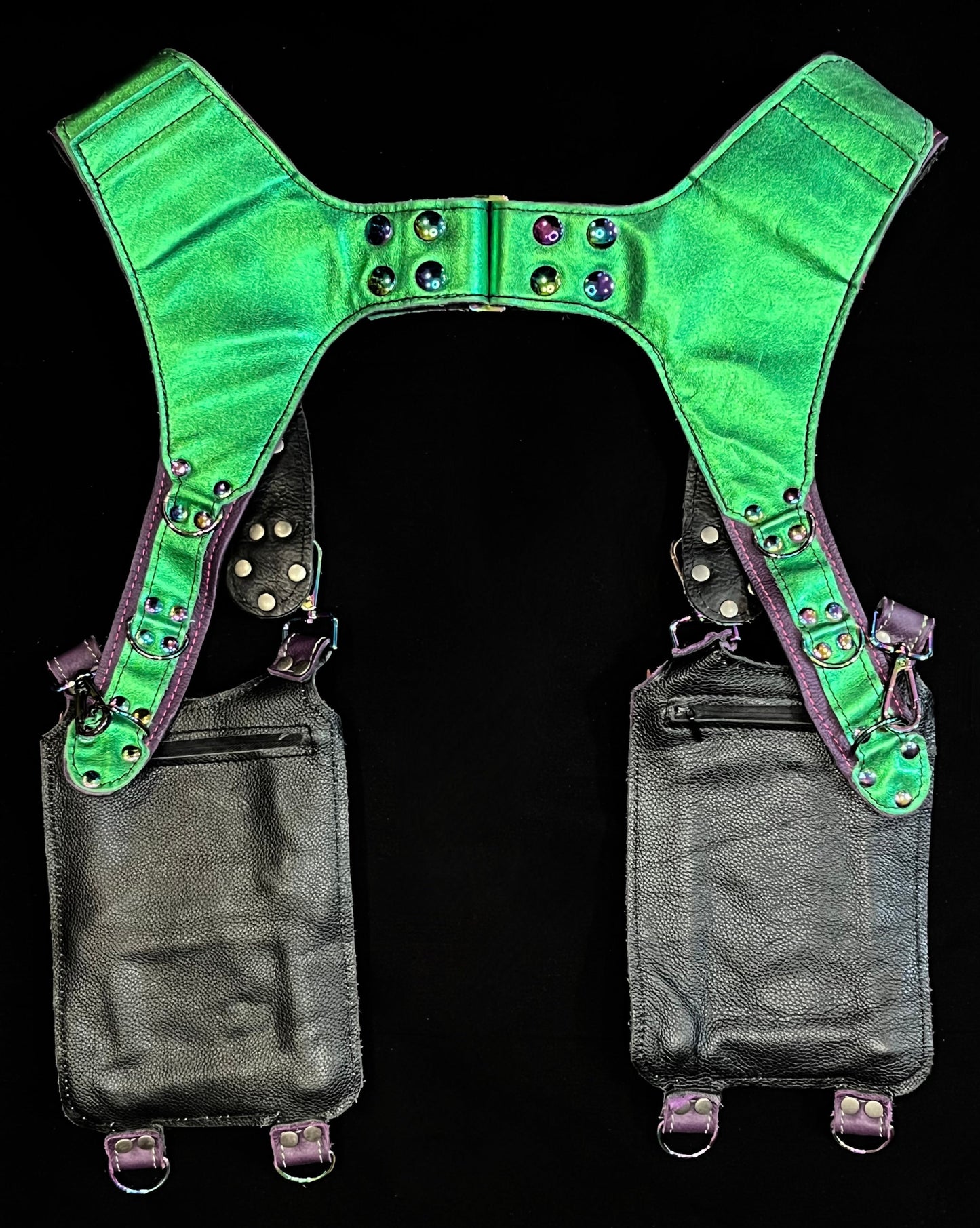 back view of black, magenta, and green holser showing hidden zipper pockets on haning pockets