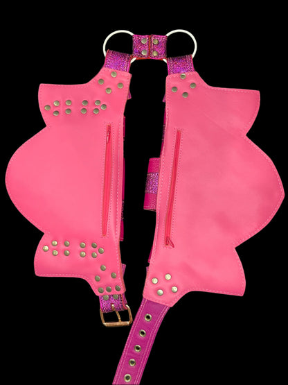 Back of pink regal belt showing coral pink leather backing and hidden zipper pockets