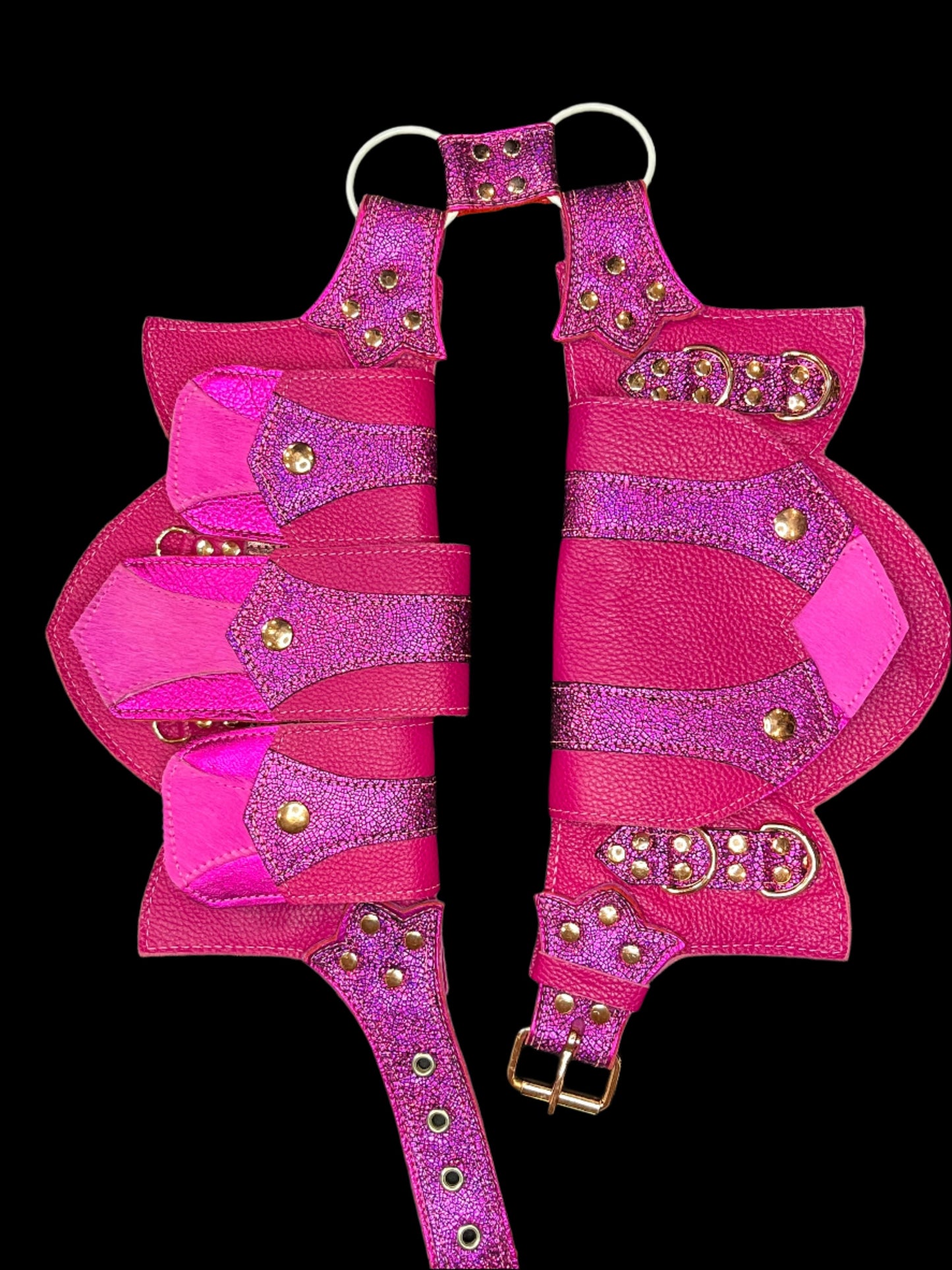 Combination of Pink Leathers Regal Belt laid flat on black background with rose gold hardware