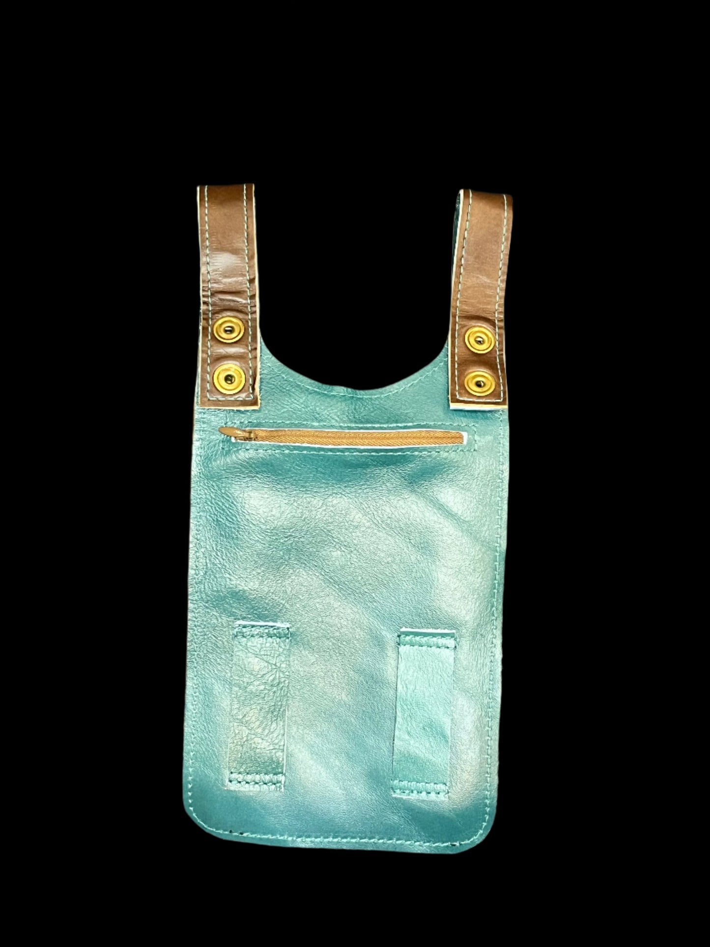 Back view of Tortuga thigh bag showing teal leather backing and hidden zipper pocket