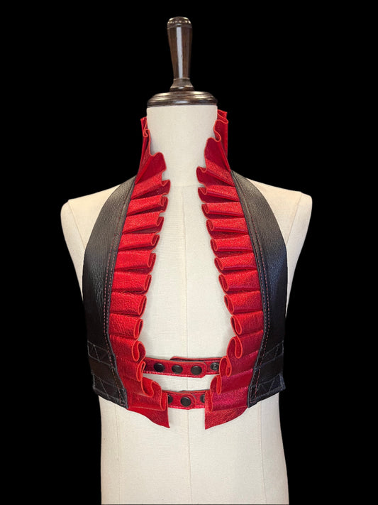 Black and metallic red ruff top on an ivory gender neutral mannequin against a black background